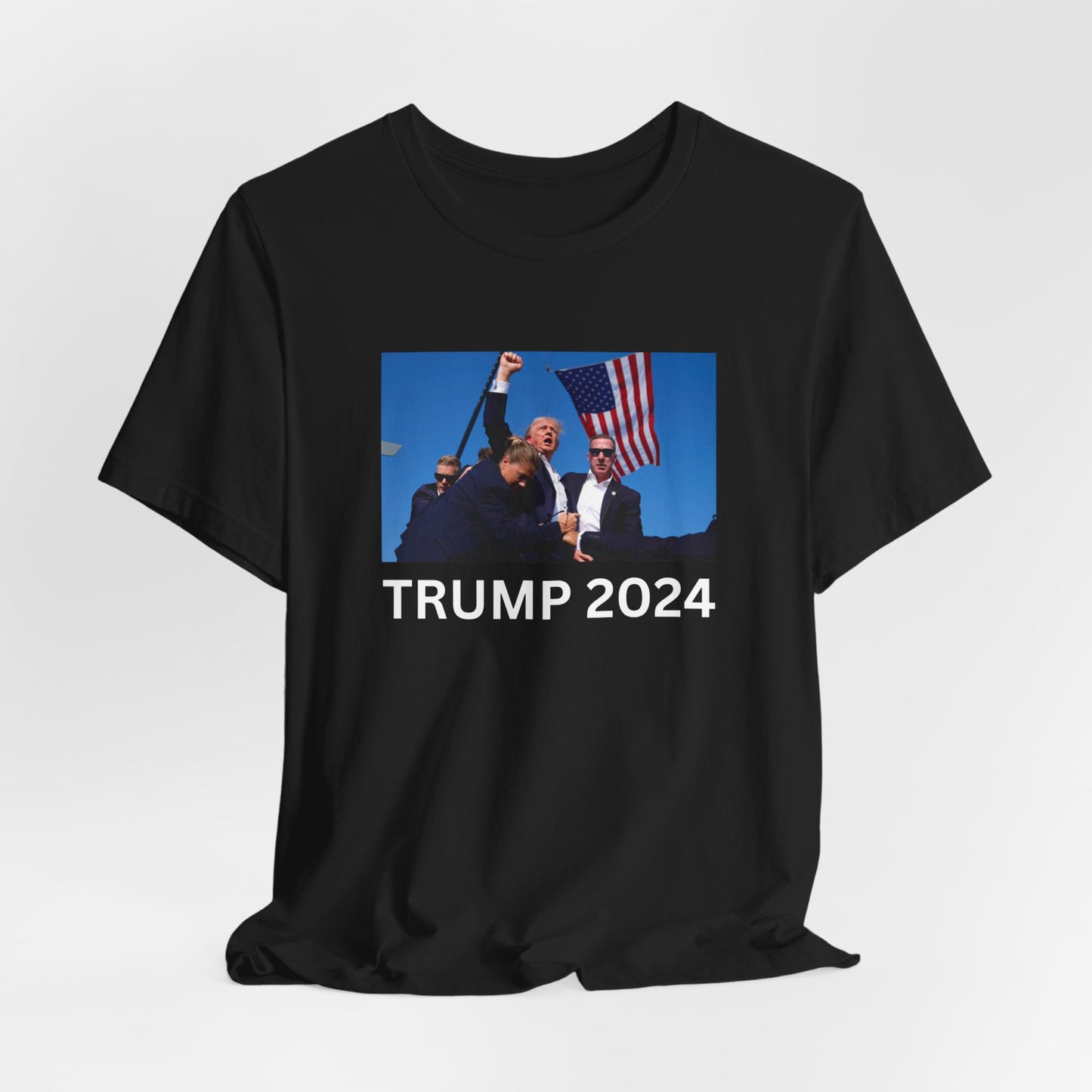 Unstoppable Spirit: Trump 2024 Rally Fist Up Tee