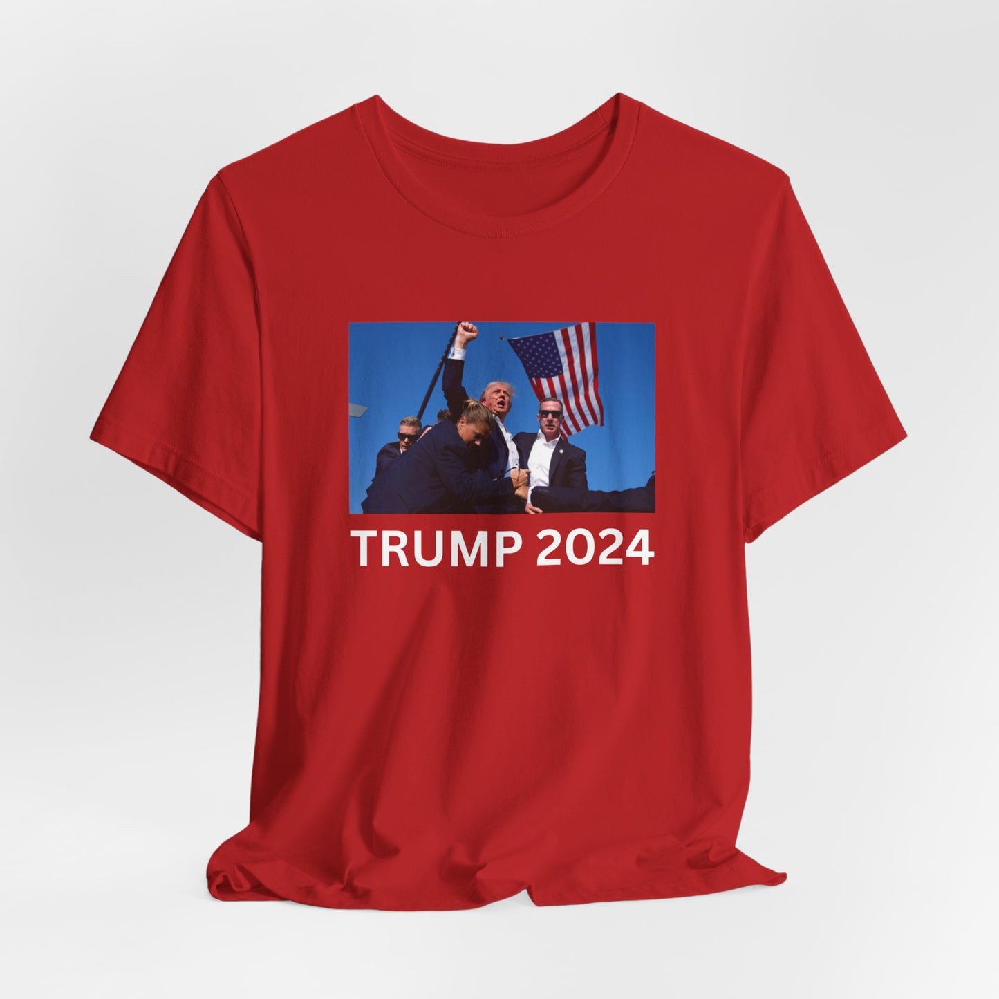 Unstoppable Spirit: Trump 2024 Rally Fist Up Tee