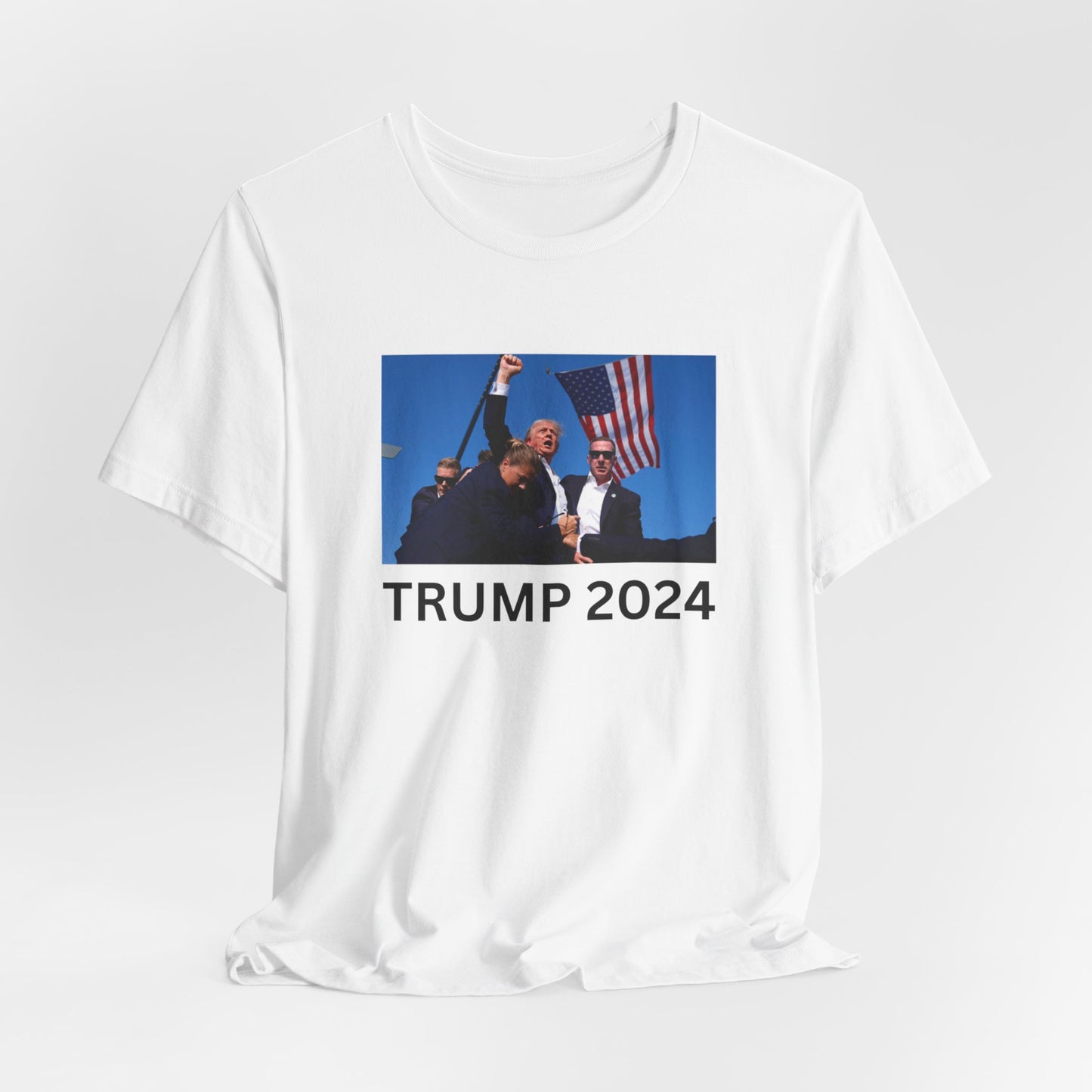 Unstoppable Spirit: Trump 2024 Rally Fist Up Tee